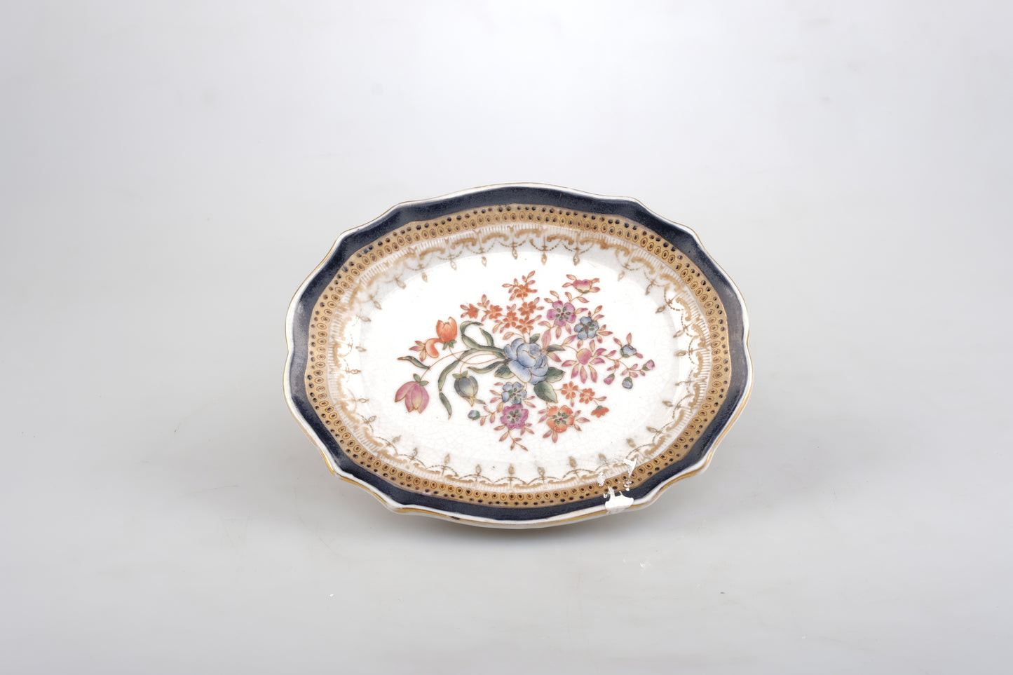 1895 WONG LEE SMALL PORCELAIN PLATE