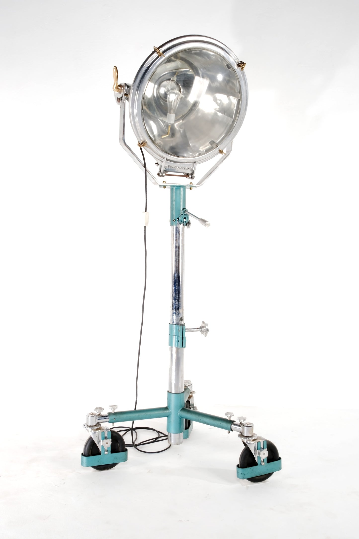 VINTAGE STUDIO SPOTLIGHT WITH SILVER AND TEAL ACCENTS