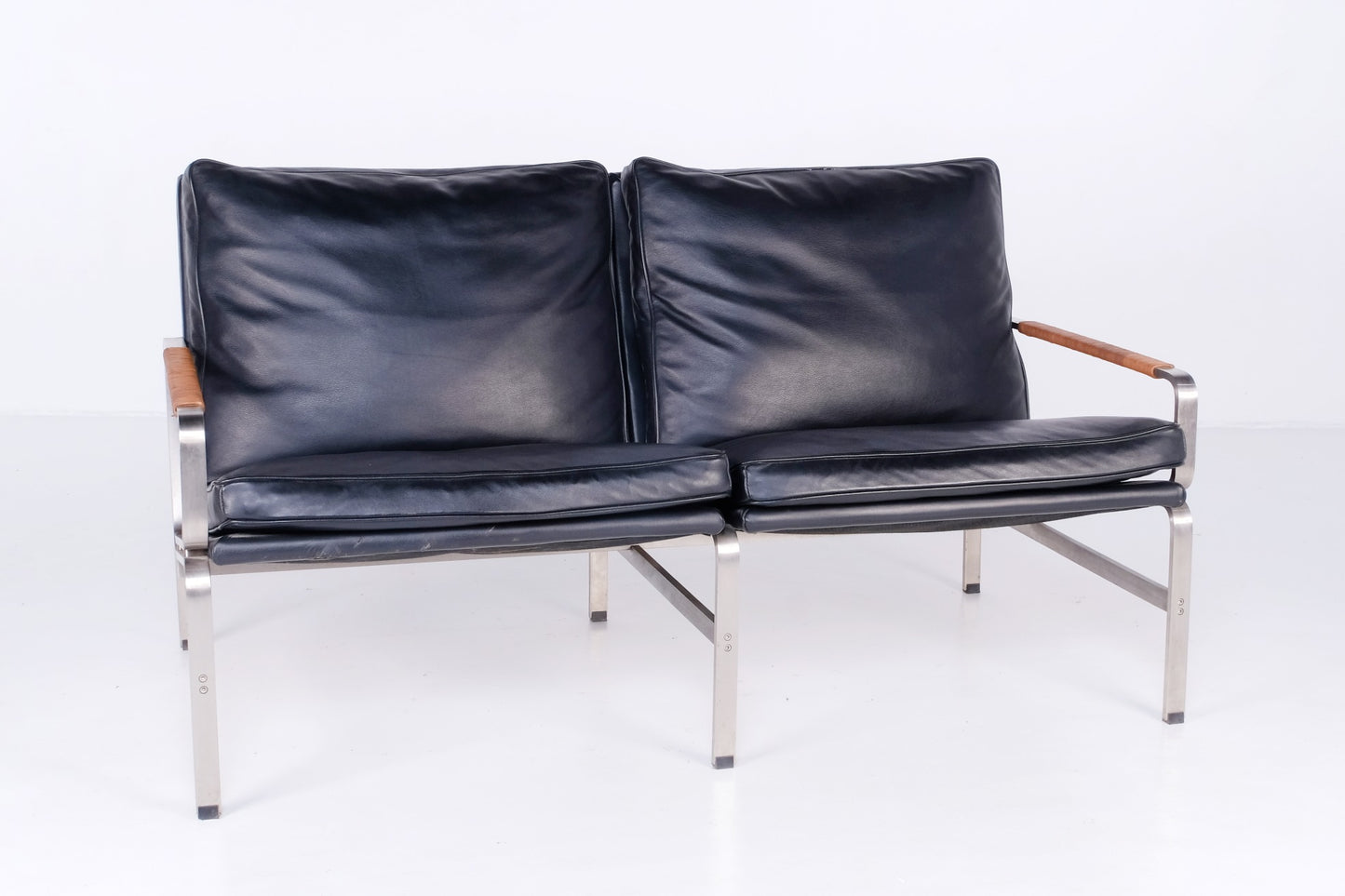 LEATHER/STEEL LOVE SEAT BY: JMSTYLE