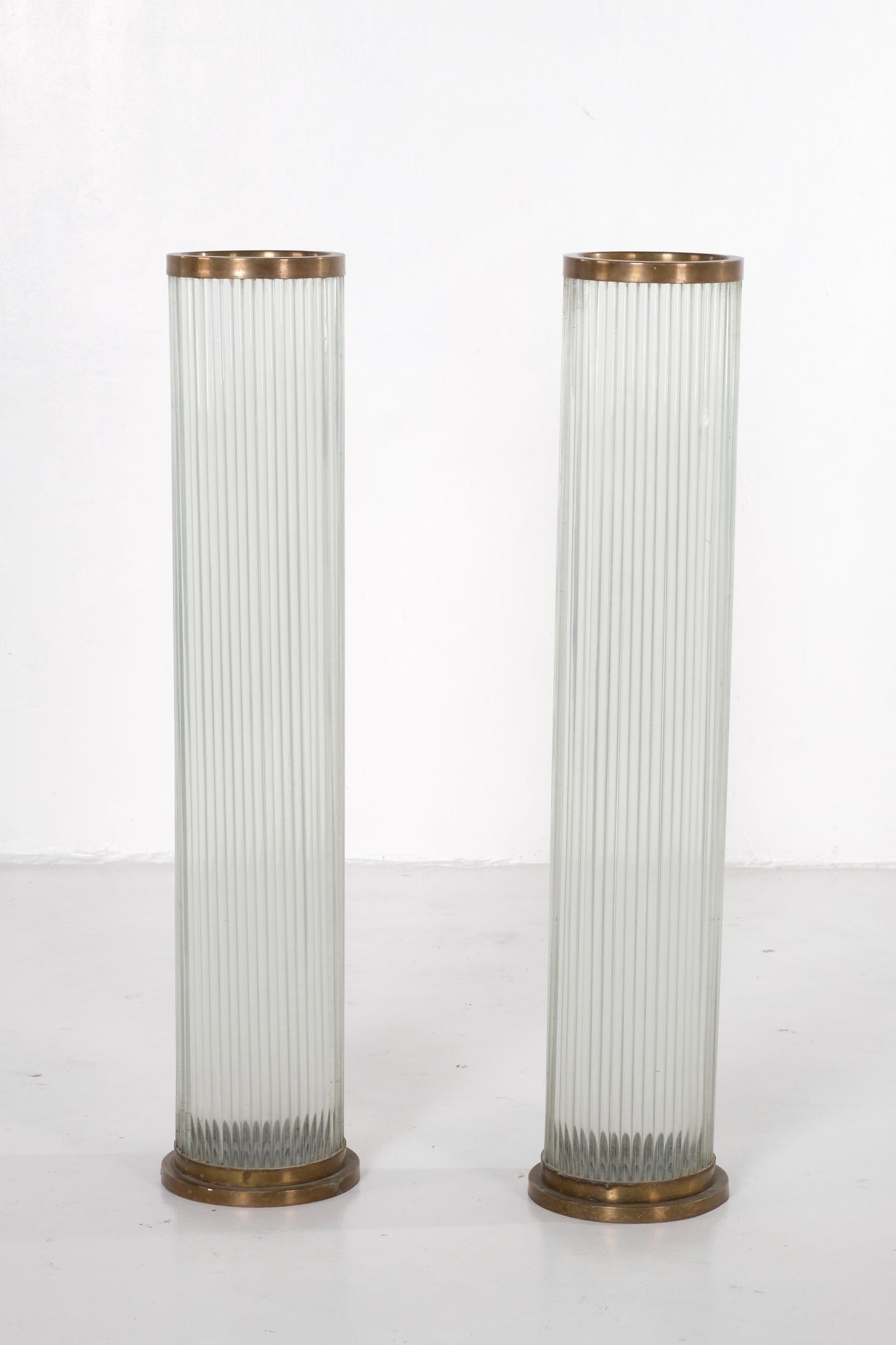 PAIR TALL GLASS CYLINDER WITH BRONZE ACCENTS FLOOR LAMP